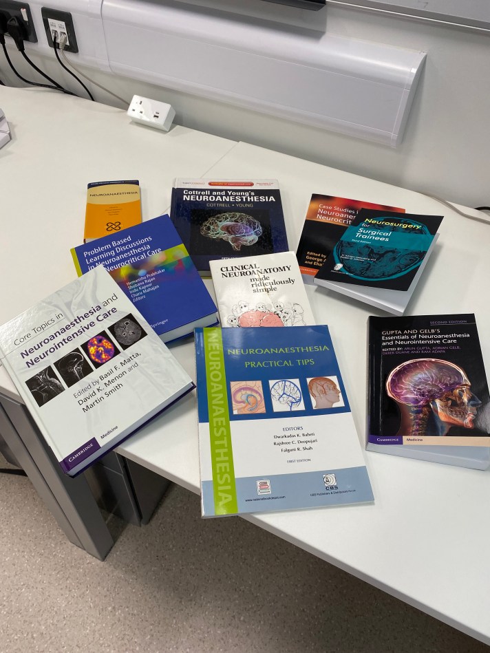 9 books on neuroanaesthesia on a table